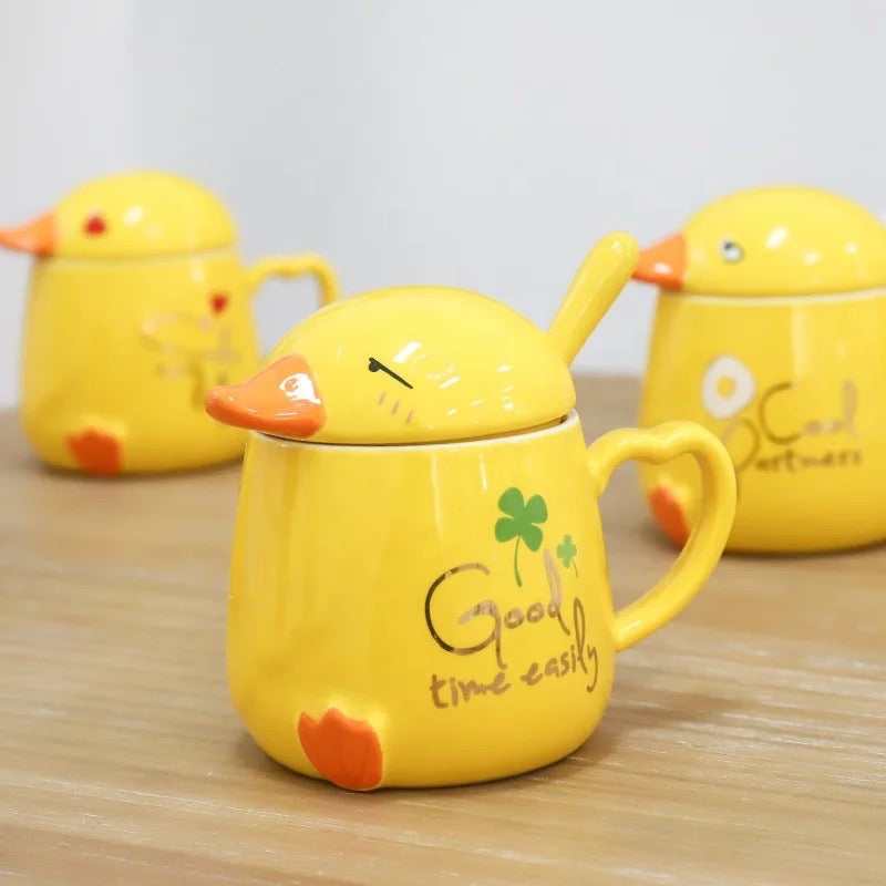 Collection of duck mugs with lid and spoon