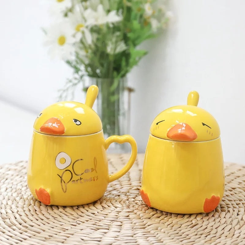 Collection of duck mugs with lid and spoon